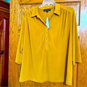 Catherine Malandrino Topaz colored woman’s shirt.  Plus size 3X.